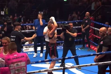 female boxer flashes crowd after win